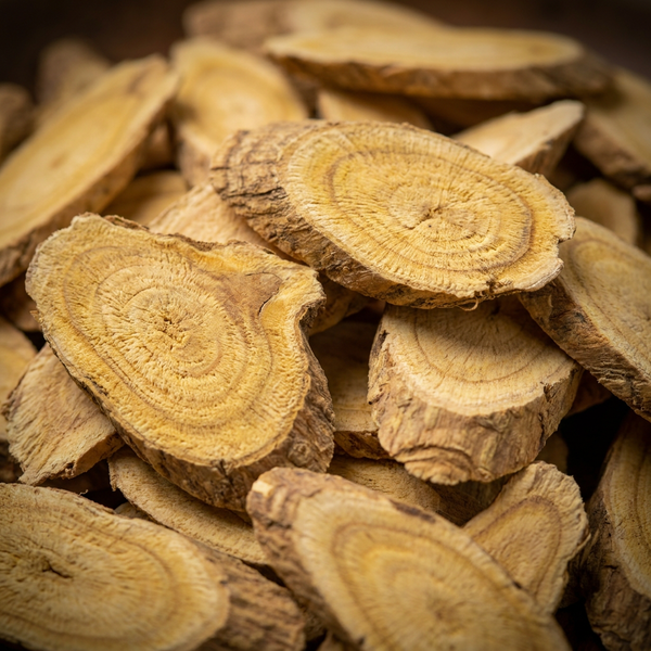 Sliced dried tongkat ali root
